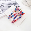 Pair of marble pattern cat hair clips in red and blue acetate with gold accents - Patterned Blue Purple