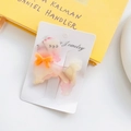 Poodle shaped acetate hair clip with pink marble texture and sparkling rhinestones - Iridescent Red