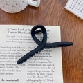Matte black oversized hair claw clip with a hollow minimalist twisted design for women - Cross Black 11cm
