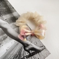 Elegant champagne organza scrunchie with a large pink and yellow iridescent butterfly bow - One Size / Metallic Red