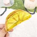 Vibrant yellow acrylic hair claw clip in a realistic sliced lemon fruit shape - Lemon