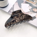 Large tortoiseshell hair claw clip in dark marble pattern with a glossy finish - Baroque Brown