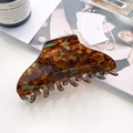 Large tortoiseshell hair claw clip with acetate finish and vintage amber patterns - Blue Brown