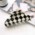 Large black and white checkerboard hair claw clip for elegant updo hairstyles - Checkered
