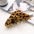 Elegant tortoise shell claw clip in amber and brown resin for stylish updos - Coffee Tortoise Shell