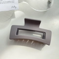 Minimalist matte dark grey rectangle hair claw clip on a stylish decorative tray - 10.5cm / Deep purple