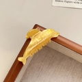 Dolphin shaped hair claw in yellow marble texture resin for elegant hairstyles - Yellow / 5cm