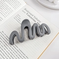 Matte dark grey S-shaped hair claw clip with wave design on vintage French book background - Light Gray 10.5CM