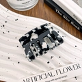 Elegant black and white marble pattern acetate hair claw clip for a stylish half-up hairstyle - Cow Pattern 5.2CM