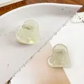 Mini heart acetate hair claws in pale green with pearlescent texture for women - Metallic Green