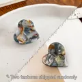 Mini heart acetate hair clips in warm mixed colors and dark marble patterns - Golden Cyan