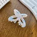 Acetate butterfly hair claw with elegant blue marble pattern and hollow wing design - Beige Blue