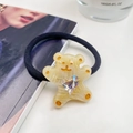 Süßes cremegelbes Bären-Haargummi mit funkelndem Herzkristall und schwarzem Gummiband - Gelb
