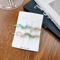 Elegant wavy acetate hair clips in green and pink marble finish with gold metal base - 7cm / Pink and Green