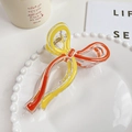 Pinza para el cabello de lazo en acrílico transparente con líneas fluidas amarillo naranja - 13cm / Naranja y Amarillo