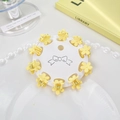 10er-Set cremegelbe Mini-Blumen-Haarklammern mit mattem Finish auf dekorativer Karte - Blume / Blassgelb
