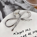 Silver bow-shaped liquid metal hair claw clip with a polished finish for women - Silver Butterfly