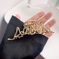 Golden liquid line metal hair claw clip with minimalist abstract hollow design - Gold Streamline