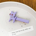 Purple acetate cat hair clip with sparkling rhinestones and a gold metal alligator base - Purple