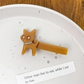 Brown acetate cat hair clip with sparkling rhinestones in a stylish duckbill design - Caramel color