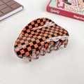 Vintage Y2K orange and black checkered hair claw clip for thick hair styling - Black Orange