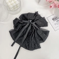Pinza per capelli con fiocco nero decorato con glitter e lunghi nastri in raso - Nero