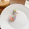 Mini butterfly hair claws in colorful gradient acetate finish on a decorative plate - Small Butterfly Dark 3.8CM