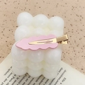 Pink wavy acrylic hair clip with gold metal base for women styling and makeup - Pink
