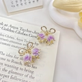 Gouden mini haarklemmen met paarse tulp ontwerp en strik detail set van twee - Paarse Lelietje-van-dalen 25 Cm / Rechtstreekse Verkoop Vanuit De Baifiya-fabriek Prijs Per Stuk.
