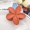 Matte coral orange plumeria flower hair claw clip with elegant frosted finish - Orange