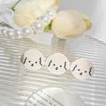 Cute cartoon puppy hair clip with three white acetate dog heads on a gold metal duckbill base - 6.8cm / Milk Coffee