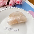 Elegant beige and pink marbled hair claw clip with semi-circle design on a stylish magazine - 8cm / Orange