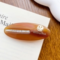 Fermaglio retrò ovale in acetato ambrato con cristalli e logo con faccina - 6.3cm / Marrone Cioccolato