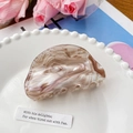 Elegant semi-circular acetate hair claw clip with beige marble texture in a ceramic dish - 8cm / Coffee