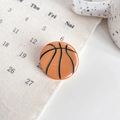 Mini orange basketball acetate hair claw clip for women with sporty texture design - Basketball