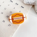 Pince à cheveux orange en forme de ballon de rugby en acétate pour femmes sportives - Rugby Orange