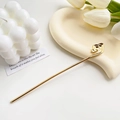 Elegante fermaglio per capelli in metallo dorato con motivo a nuvole e finitura lucida - Nuvole Auspicose Oro