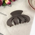 Matte dark brown oversized wavy hair claw clip for thick hair in a retro minimalist setting - Pumpkin Chocolate Brown