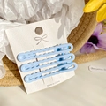 Set of three wave-shaped light blue candy color hair clips on white card display - 6cm / Sky Blue