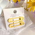 Lot de deux barrettes à cheveux ondulées jaune vif sur une carte de présentation vintage - 6cm / Jaune