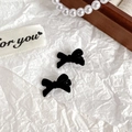 Pair of elegant black velvet bow hair clips with soft flocking texture and pearl decor - Mini Bow Black