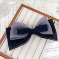 Elegant black and gray multi-layered sheer tulle bow hair clip on a jewelry tray - Black