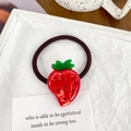 Elastic hair tie with a decorative red strawberry charm and sparkling rhinestones - Strawberry