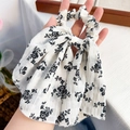 Floral bow scrunchie in white fabric with black patterns and long elegant ribbons - Black Floral