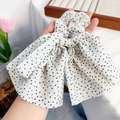 White floral hair scrunchie with black star pattern and large vintage bow tie design - Small Star