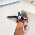 Pinza para el pelo estrella de mar de acetato con perla en acabado multicolor vibrante - Azul Multicolor