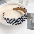 Elegante zwart-witte geruite hoofdband met een stijlvol tweed textuur ontwerp - Zwart & Wit