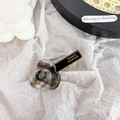 Elegant grey acetate flower hair clip with France Handmade gold lettering on black base - Phantom Grey