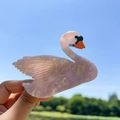 Elegant swan-shaped hair claw clip in iridescent pearlescent pink with golden details - White Swan