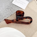 Elegant tortoiseshell leopard print hair claw clip in a stylish hollow geometric design - Brown Leopard Print
